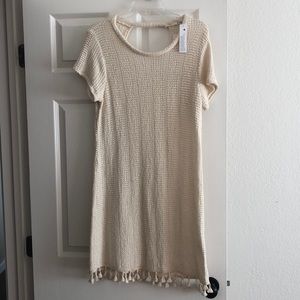 Brand-new dress with tassel details